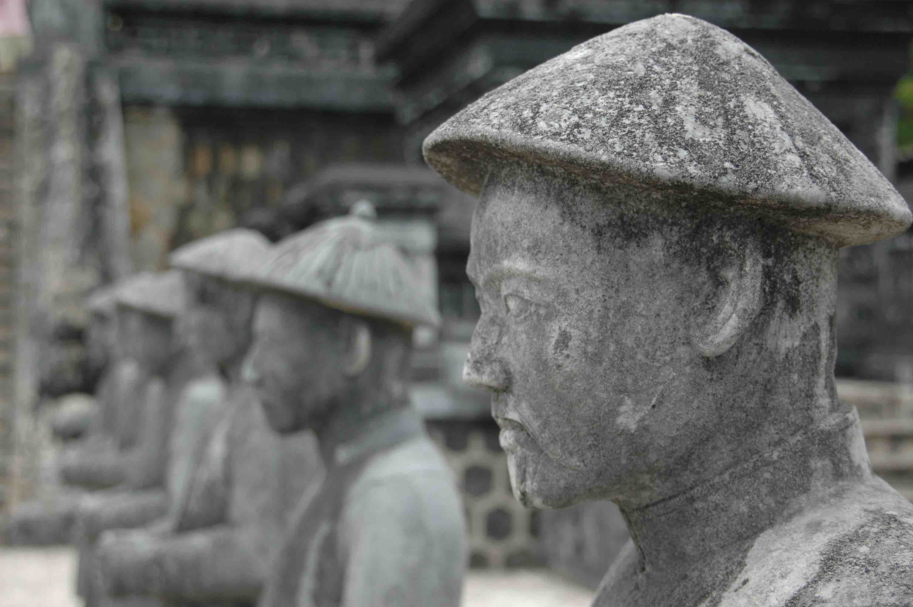 Statues with Conical Hat